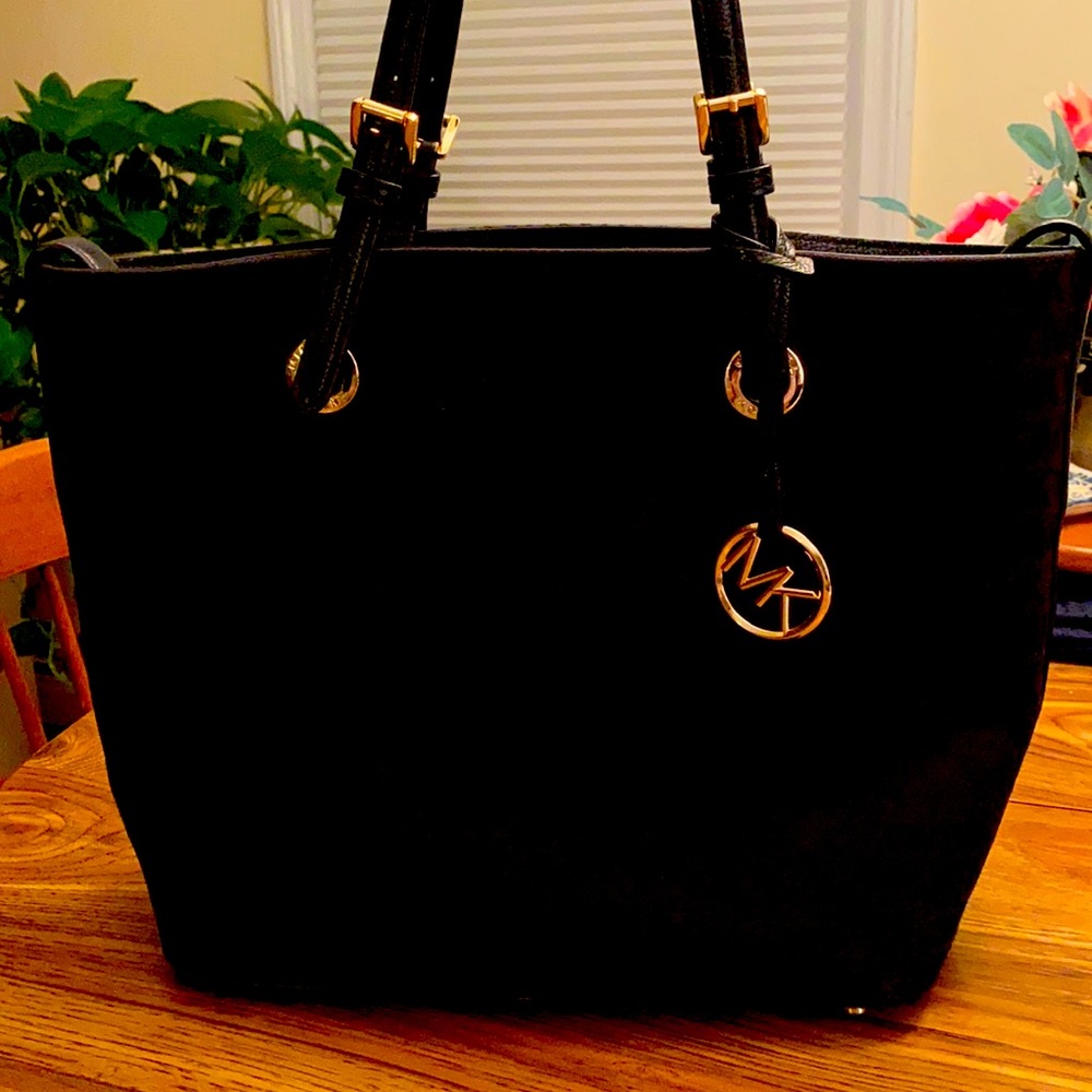 Michael Kors black purse.